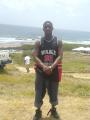 , young black male wid ears peirce and tattoo